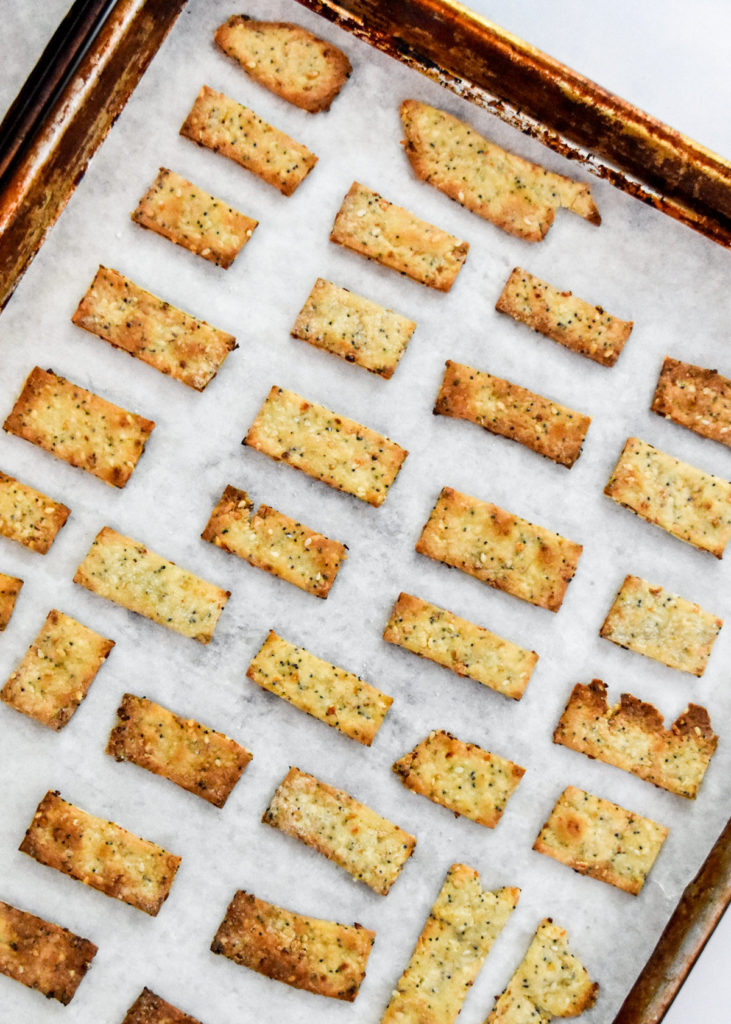 baked homemade everything but the bagel crackers on a sheet pan.