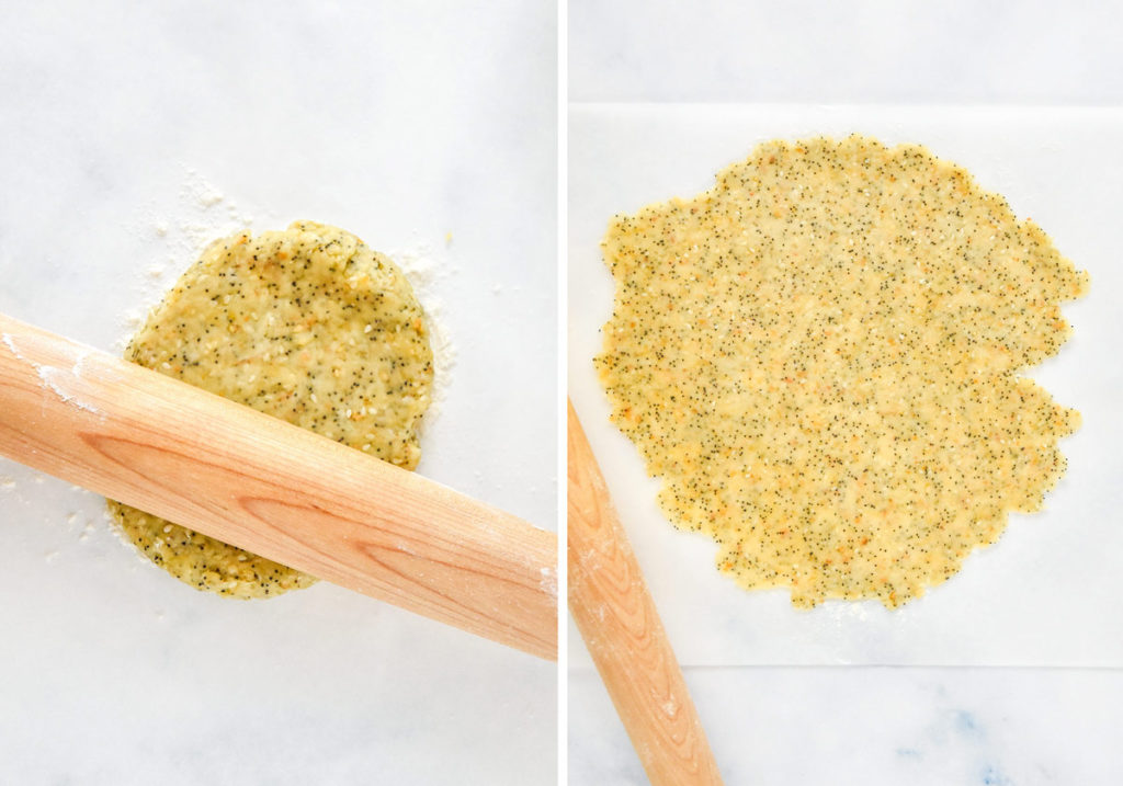 rolling out a ball of dough to make crackers using a french rolling pin.