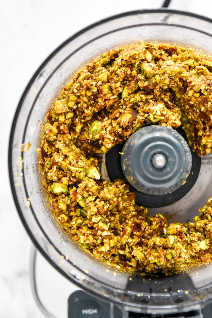 blended up dates, pistachios, oats, vanilla and salt to make the pistachio date energy balls.