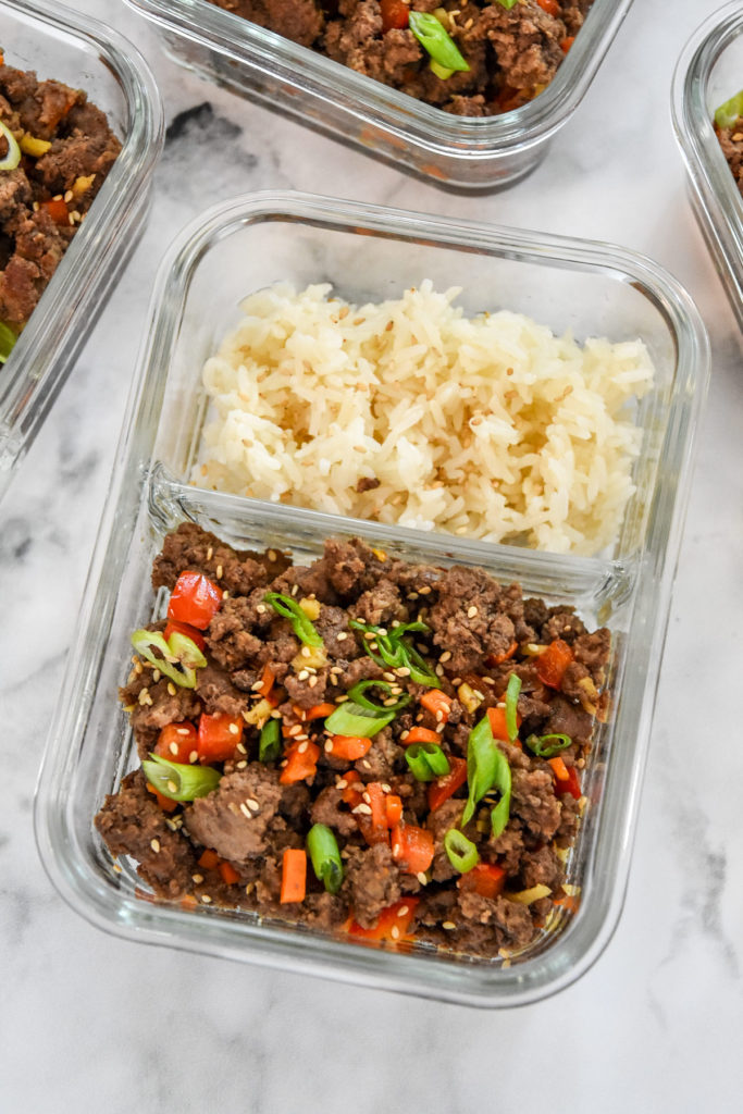 Ginger Ground Beef Bowls with white rice in a meal prep container.