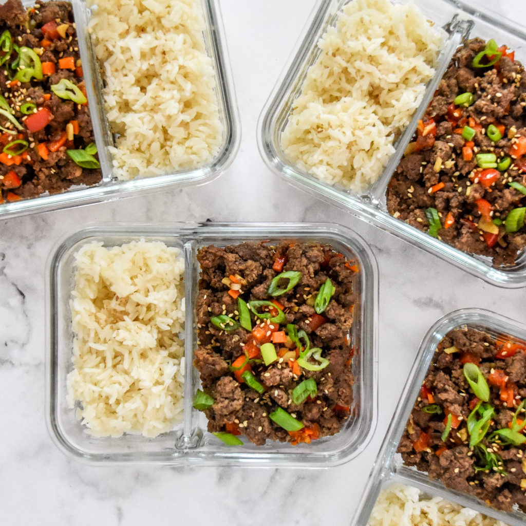 Ginger Ground Beef Bowls with white rice in a meal prep container.