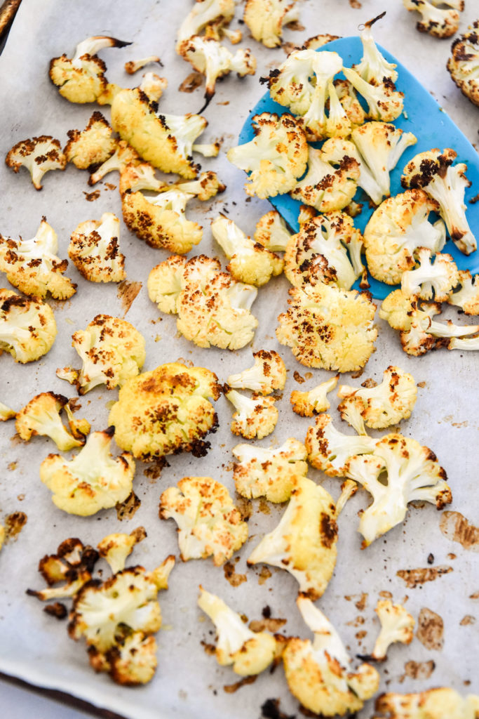 roasted cauliflower on a sheet pan.
